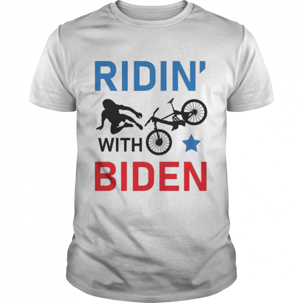 Joe Biden falls off his bike Ridin’ with Biden shirt