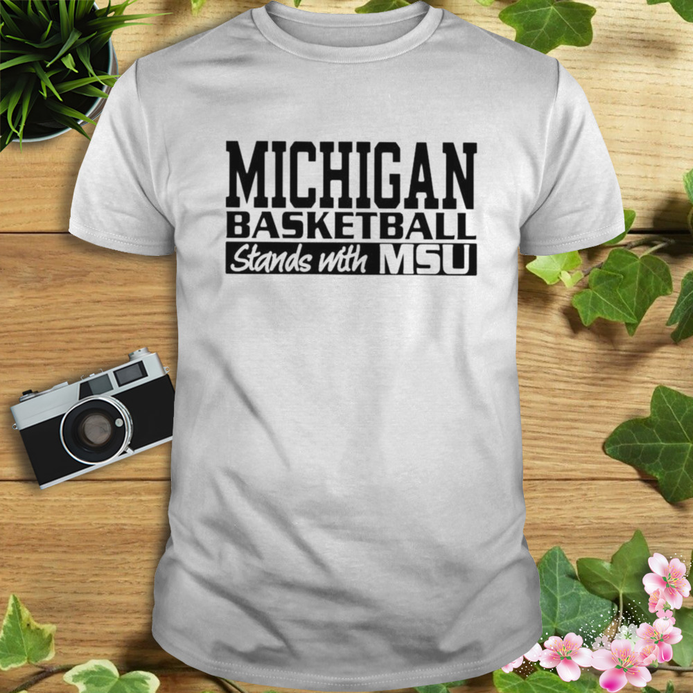 michigan basketball stands with MSU shirt