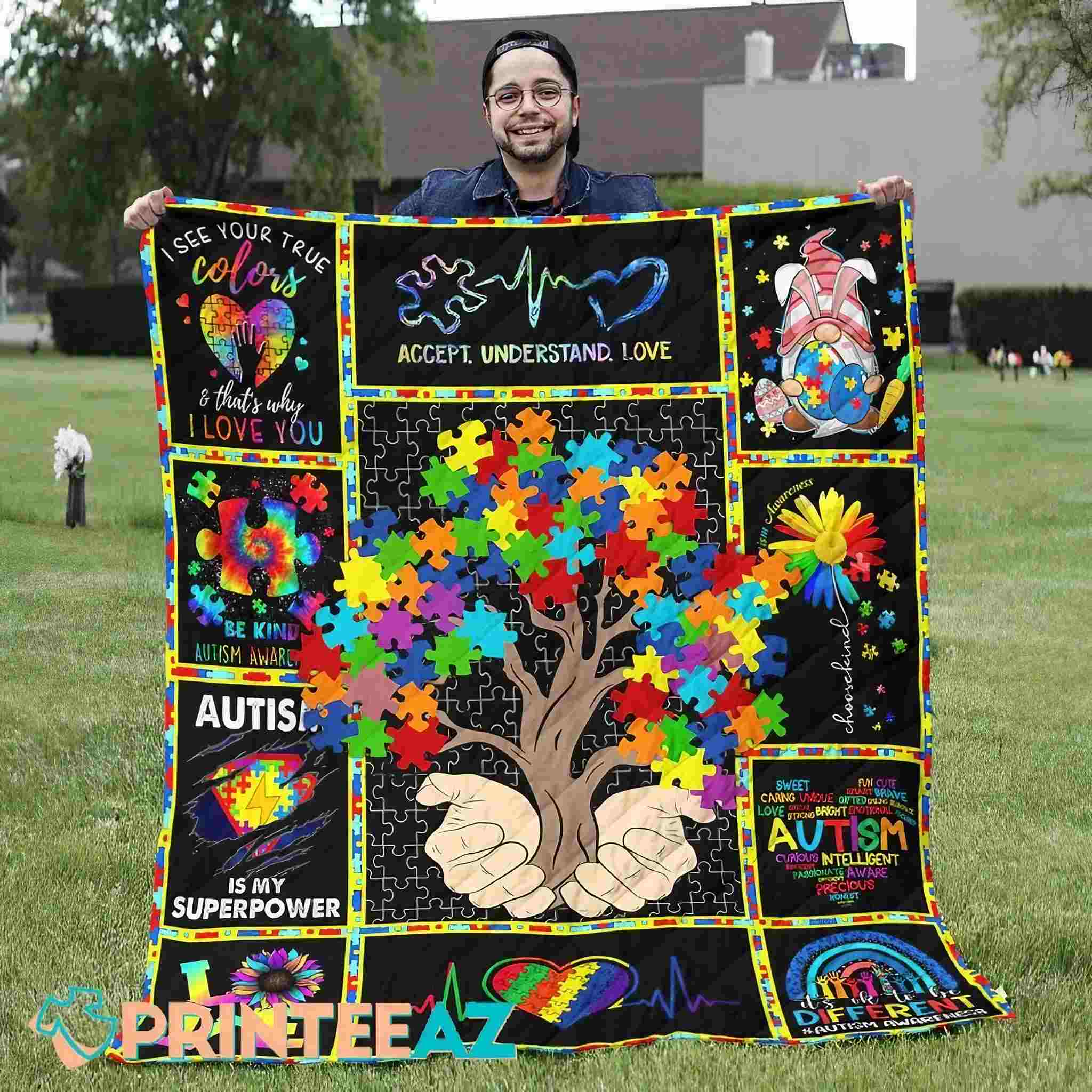 hands holding a tree autism quilt blanket puzzles - PrinteeAZ