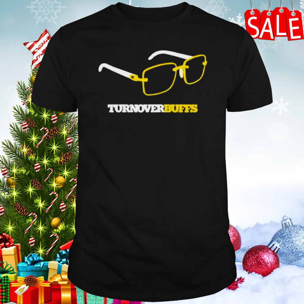 Tracy Wolfson wearing glasses turnover buffs shirt