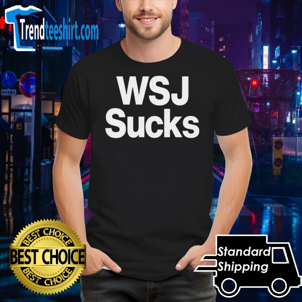 Elon Musk wearing WSJ sucks shirt