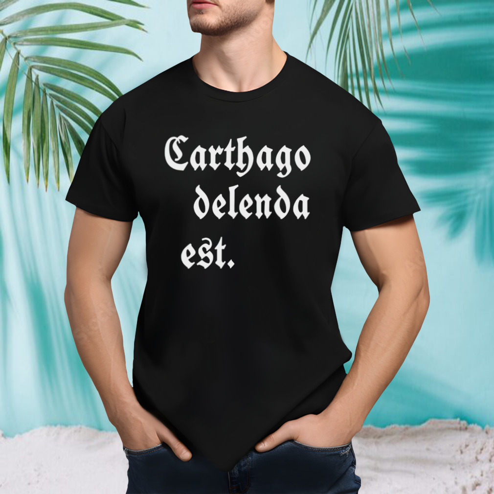 Zuck Bucks wearing carthago delenda est shirt